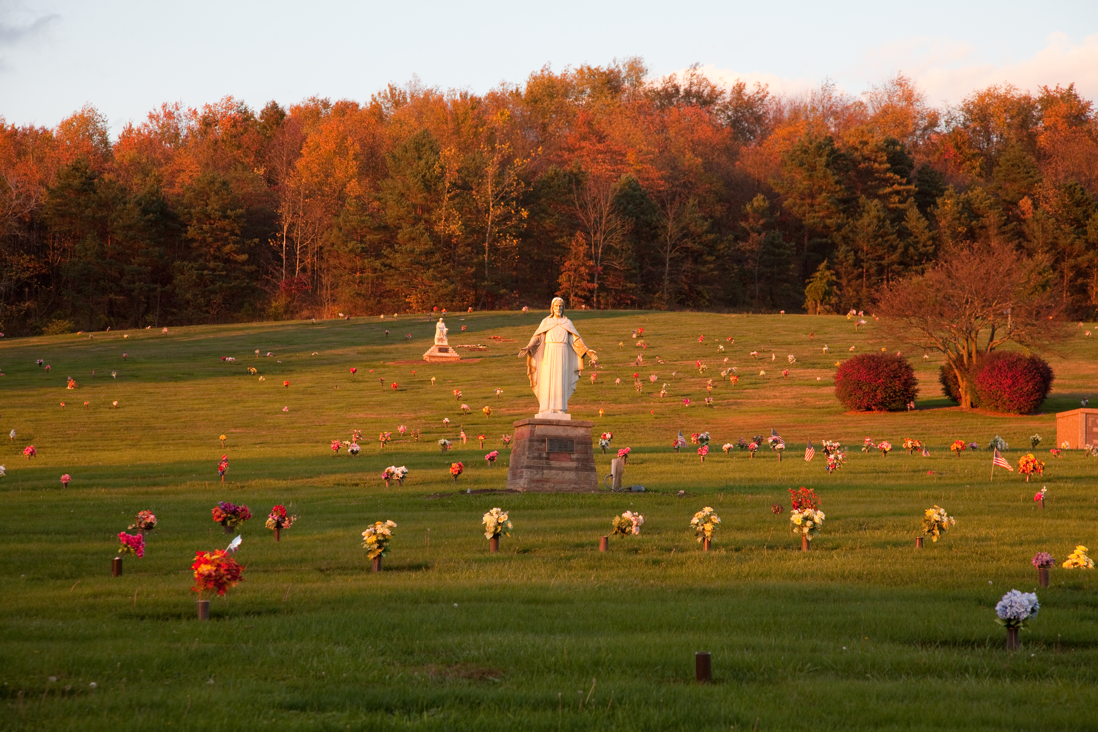 Companion cemetery burial plot for couples with double headstone marker